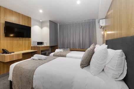 Twin Room | Premium bedding, down comforters, memory foam beds