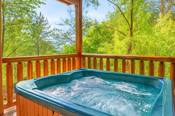 Private covered hot tub with peaceful Smoky Mountain views.