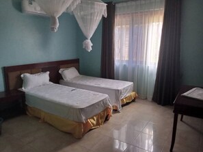 Memory-foam beds, individually furnished, laptop workspace, free WiFi - Bucolic Heritage Resort (Adjumani)