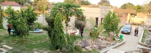 Quarto casal executivo | Vista para o jardim