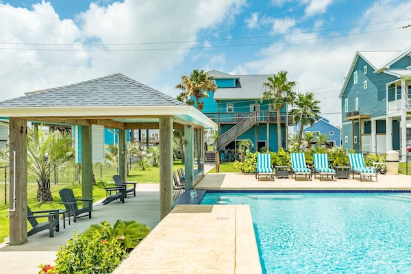 Lounge pool side or sit at the swim up bar