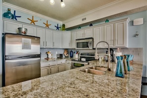Condo, 4 Bedrooms | Private kitchen - Tropic Winds by Forehand Rentals (Panama City Beach)