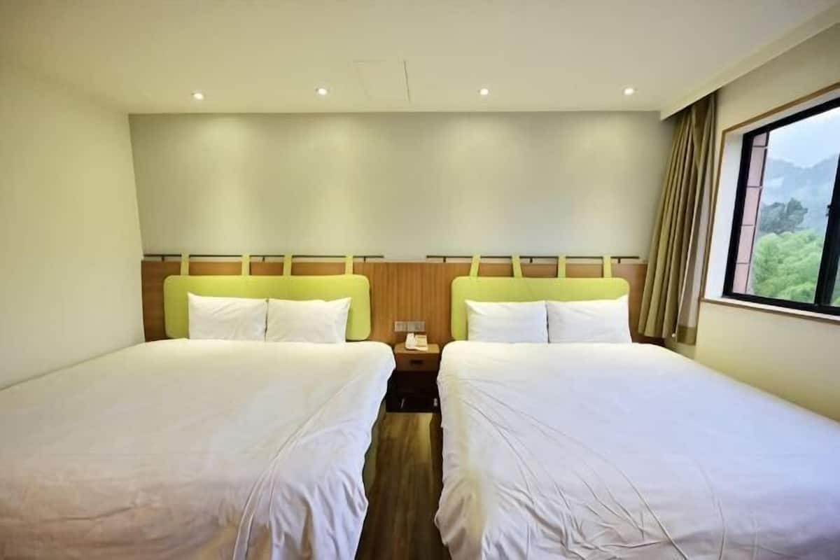 Desk, laptop workspace, free WiFi, bed sheets