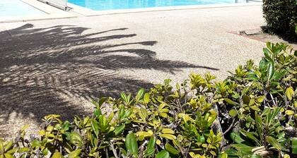 In residence with swimming pool, renovated house sleeps 5