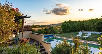 Tennis court and pool, and amazing views.