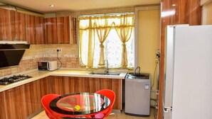 Apartment | Private kitchen | Fridge, microwave, oven, stovetop - Magnificent Serviced 1 and 2 Bedroom Apartments (Kampala)