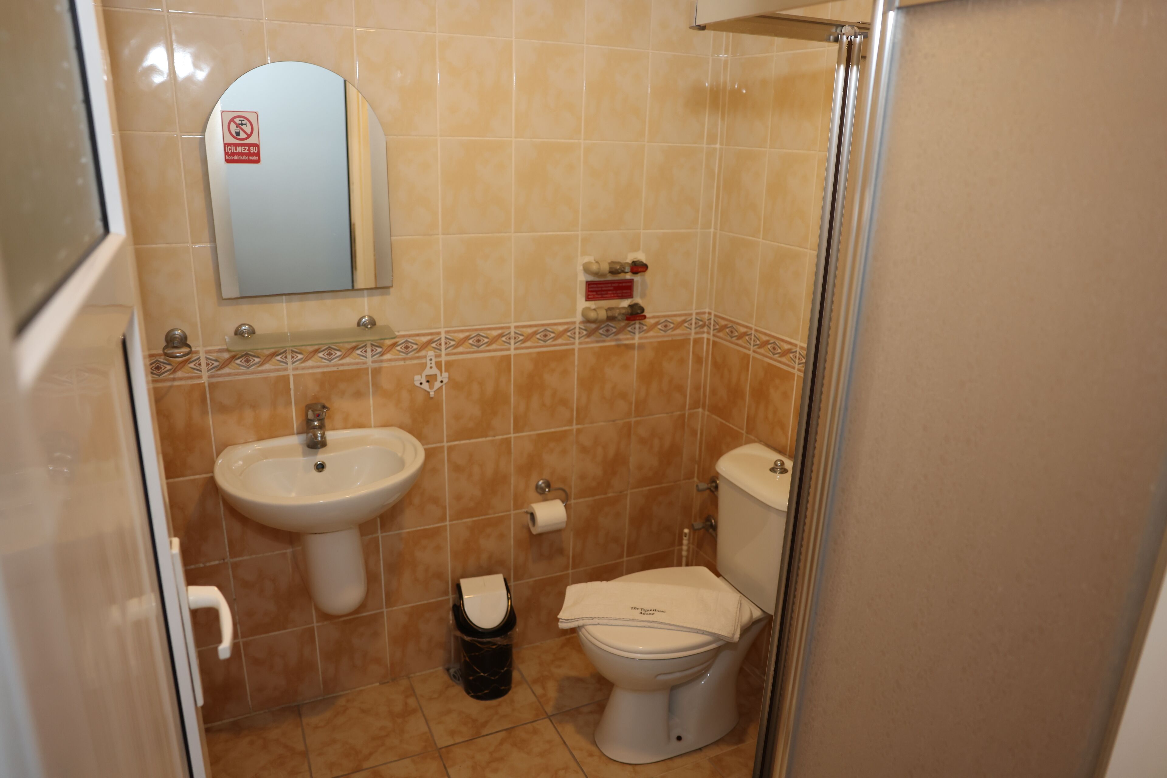 deluxe triple room | bathroom | designer toiletries, hair dryer, towels, soap