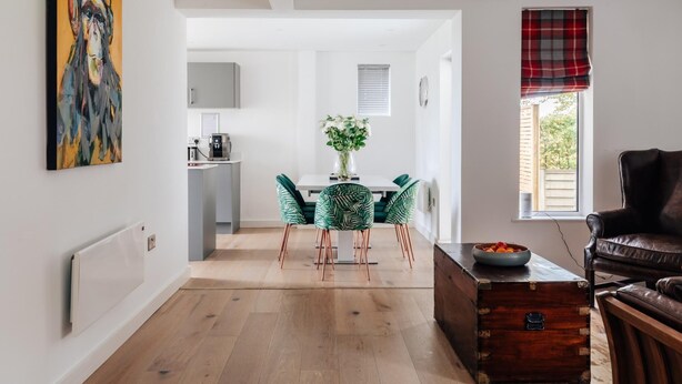 A modern living room with a dining area, a coffee machine, and a view of the outdoors. - CH Apt 2 2bed in Bath (Bath)