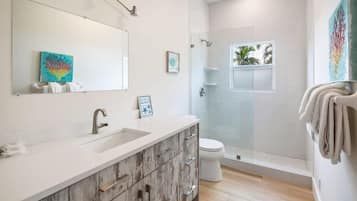 Bathtub, hair dryer, towels