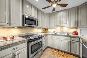 Coffee/tea maker, fridge, microwave, oven