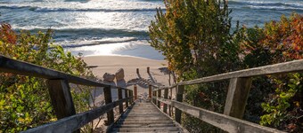 Low-bluff cottage with private Lake Michigan beach