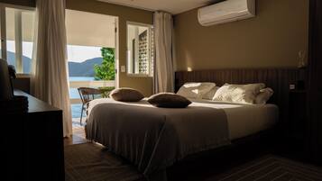 Premium bedding, memory foam beds, minibar, in-room safe