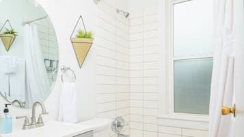 Bathtub, hair dryer, towels