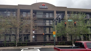 A multi-story building with a sign reading "Downtown Inn". - Downtown Inn #3- King Room (Asheville)