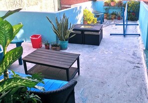 Casa de Suenos | Área de sala de estar | Televisión de pantalla plana de 52 pulgadas con canales por cable 