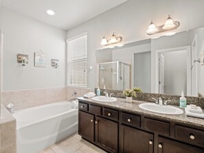 Combined shower/tub, hair dryer, towels, soap