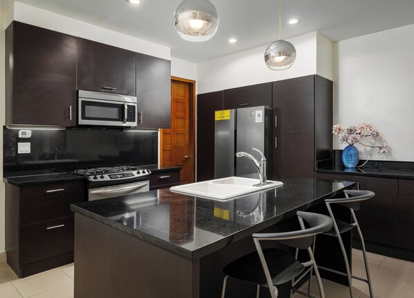 Fridge, microwave, oven, stovetop - Exclusive Loft in Buenaventura Corotú Plaza (Río Hato)