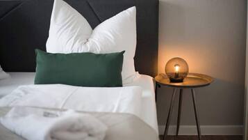 1 habitación, tabla de planchar con plancha, wifi gratis y ropa de cama