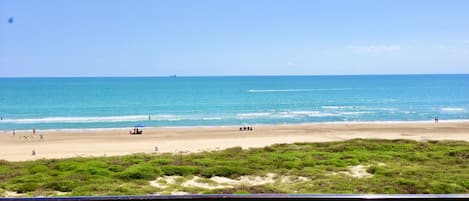 On the beach, sun-loungers, beach towels