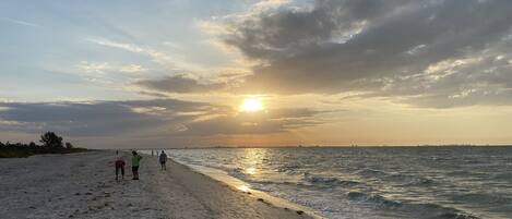 On the beach, sun loungers, beach towels