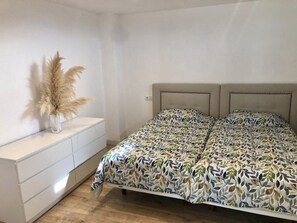 2 dormitorios, tabla de planchar con plancha, wifi