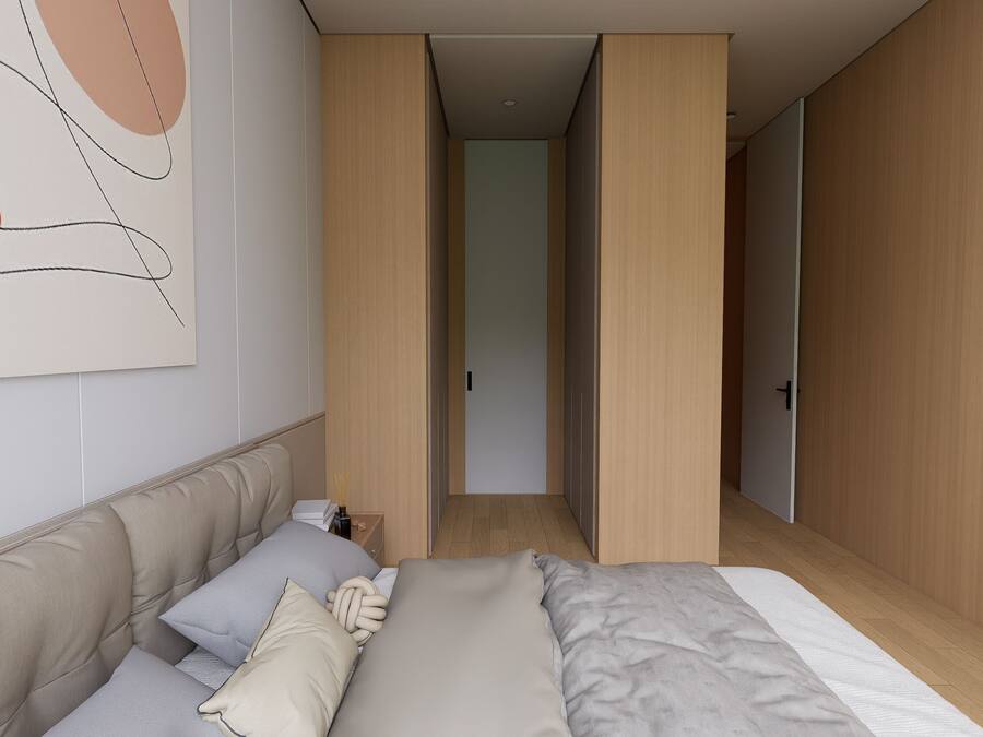 Ein modernes Schlafzimmer mit Bett, Nachttisch und einem Kunstwerk an der Wand.