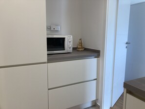 Luokittelematon kuva, 4 kautta 20, painike