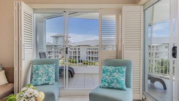 One Bedroom Spa Suite | Living area | 32-inch Smart TV with digital channels