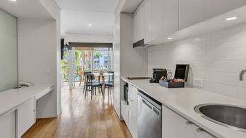 Electric kettle, cleaning supplies, dining tables