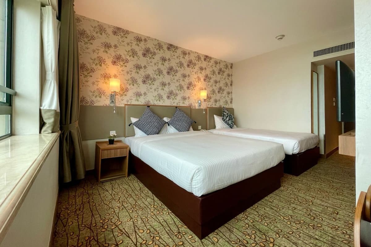 Family Triple Room, Non Smoking, Harbour View | In-room safe, desk, blackout curtains, free WiFi