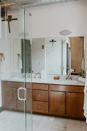 Bathtub, hair dryer, towels, soap