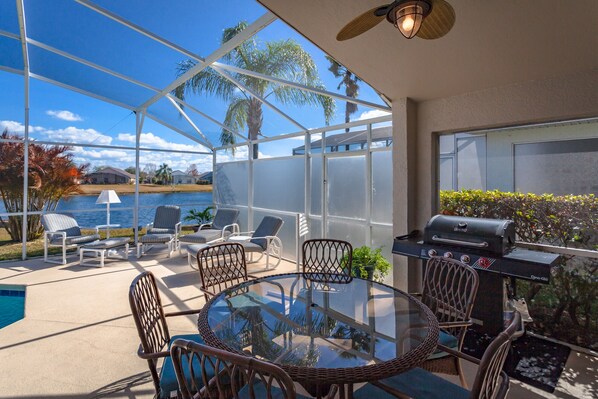 Enjoy al fresco dining on the patio overlooking the water, where you can grill and relax in style.