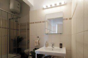 Apartment, 2 Bedrooms | Bathroom | Shower, hair dryer, towels, soap - Central Apartments by Konnect, Ipsos (Corfu)