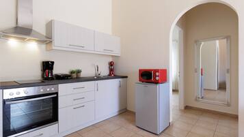 Apartment | Private kitchen | Fridge, oven, stovetop, coffee/tea maker
