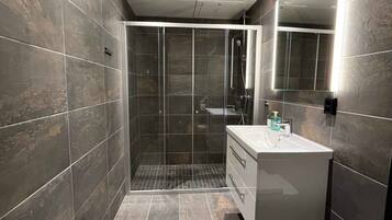Trysil Alpine Lodge Prestige Mountain view | Bathroom | Shower, towels