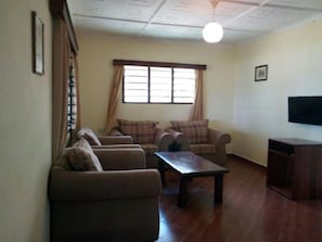 Apartment, 3 Bedrooms, Garden View | Living area - Coral Beach Resort (Diani Beach)