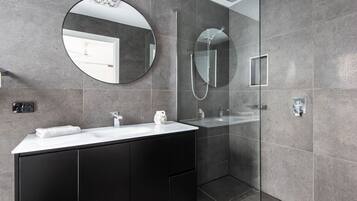 Bathtub, hair dryer, towels