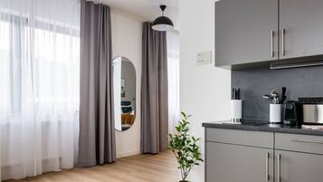 Suite with Sofa bed | Private kitchen | Fridge, espresso maker, electric kettle, toaster