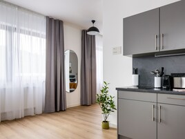Suite with Sofa bed | Private kitchen | Fridge, espresso maker, electric kettle, toaster