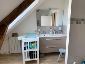Bathtub, hair dryer, towels, soap