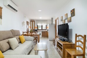 TV - Holiday Apartment 'Villa Fornell I' with Shared Pool, Terrace & Wi-Fi (Conil)