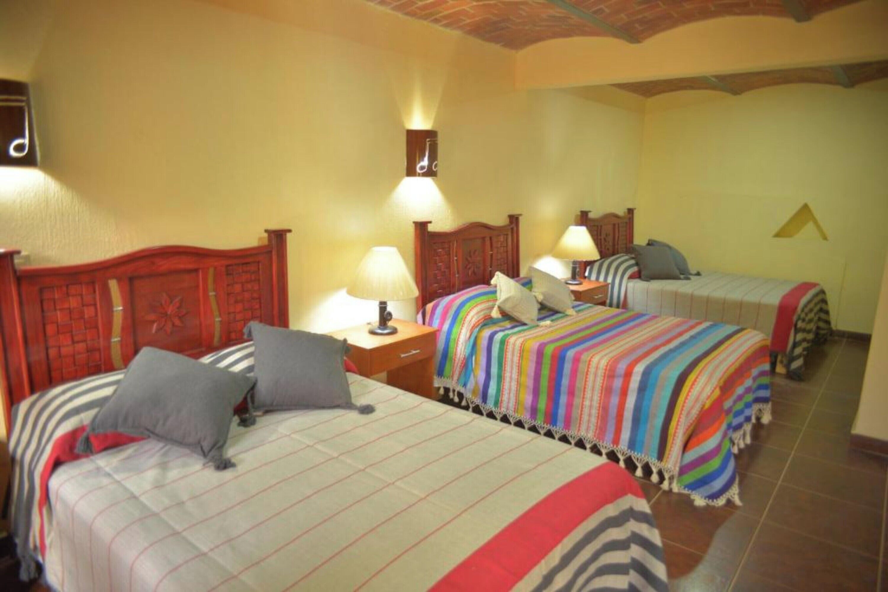 Standard Triple Room | Minibar, iron/ironing board (on request), free WiFi, bed sheets