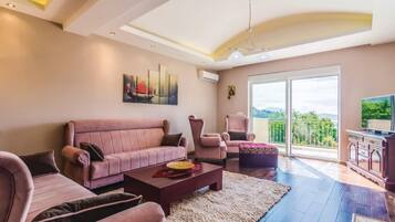 Family Villa, Multiple Bedrooms, Mountainside (Pool Villa Panorama Mojdež) | Living area | 21-inch TV with digital channels, DVD player, stereo