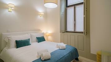 1 habitación, tabla de planchar con plancha, wifi gratis y ropa de cama