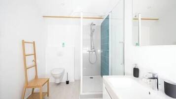 Hair dryer, towels, soap, toilet paper