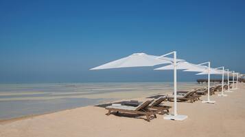 Private beach, free beach cabanas, sun loungers, beach umbrellas