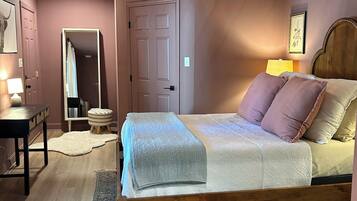 1 bedroom, desk, iron/ironing board, travel crib