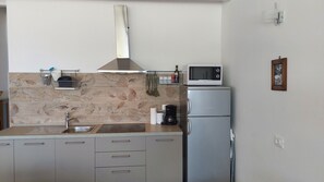 Fridge, microwave, coffee/tea maker, electric kettle