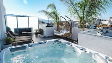 Deluxe Suite With Outdoor Jacuzzi | Balcony view