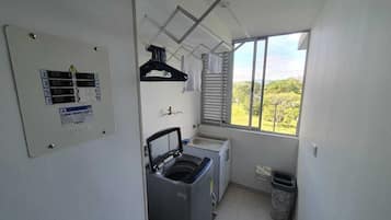 Shower, towels, soap, toilet paper